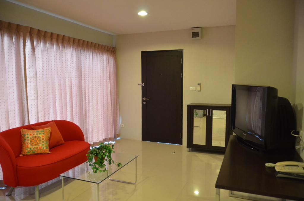 Aparthotel Bangkok Living Zimmer foto